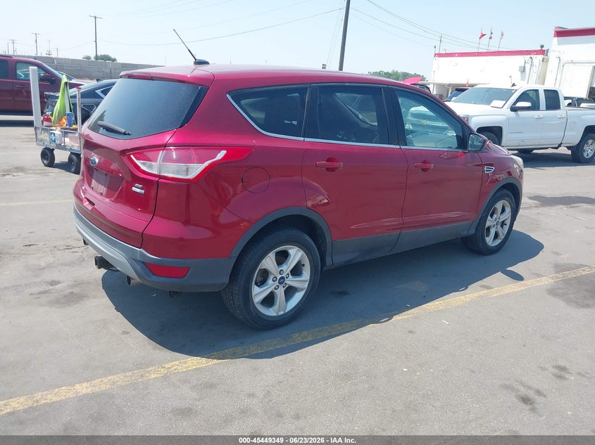 2013 Ford Escape VIN 1FMCU9GX0DUC60871 IAAI salvage auction — NORMAL WEAR, Clear (Utah), sold $1,200 on 2026-07-09 (photo 4)