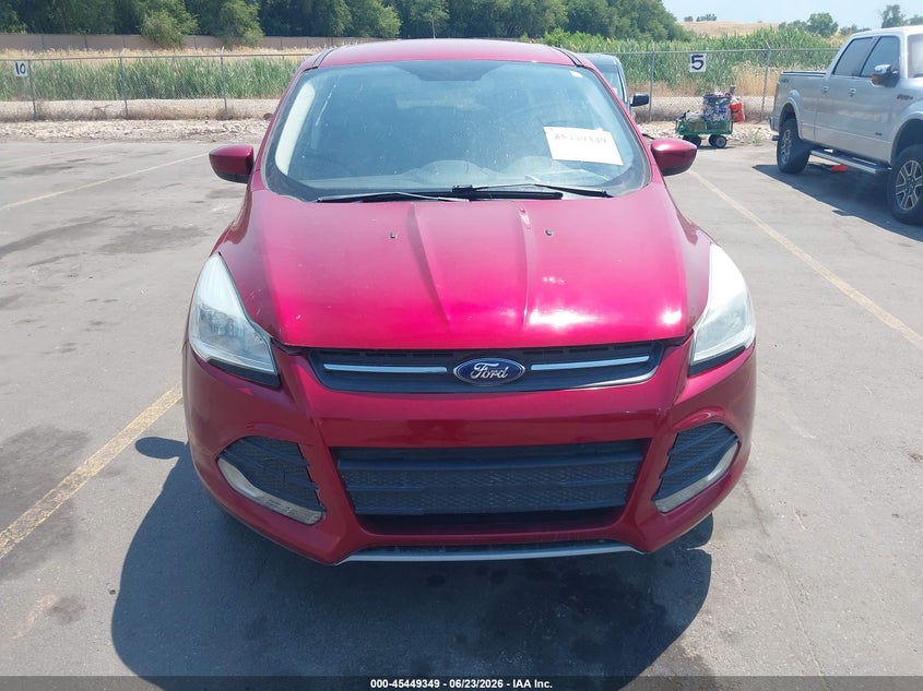 2013 Ford Escape VIN 1FMCU9GX0DUC60871 IAAI salvage auction — NORMAL WEAR, Clear (Utah), sold $1,200 on 2026-07-09 (photo 6)