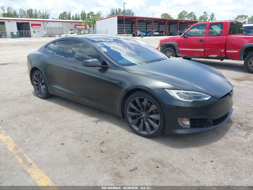 2017 Tesla Model s VIN 5YJSA1E23HF229582 IAAI salvage auction — NORMAL WEAR, Salvage Title, sold $1,550 on 2026-07-29 (photo 1)