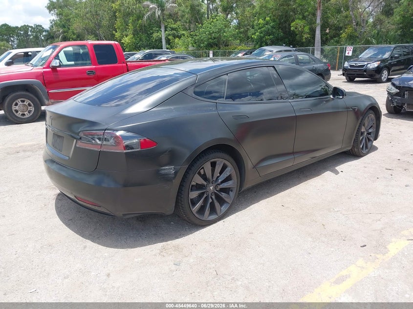 2017 Tesla Model s VIN 5YJSA1E23HF229582 IAAI salvage auction — NORMAL WEAR, Salvage Title, sold $1,550 on 2026-07-29 (photo 4)