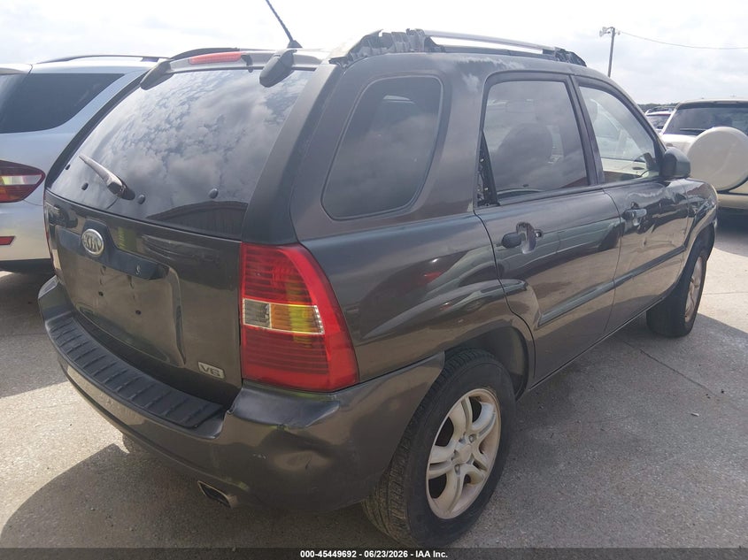 2006 Kia Sportage VIN KNDJF723967141488 IAAI salvage auction — NORMAL WEAR, Original (Texas), sold $450 on 2026-07-29 (photo 4)