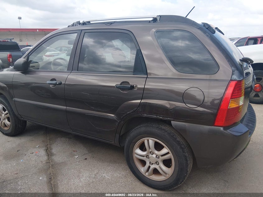 2006 Kia Sportage VIN KNDJF723967141488 IAAI salvage auction — NORMAL WEAR, Original (Texas), sold $450 on 2026-07-29 (photo 6)