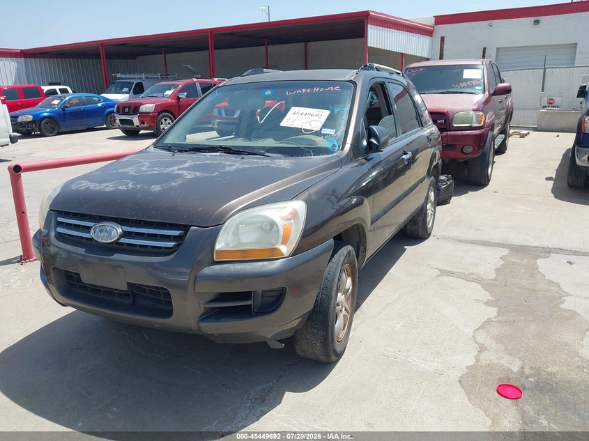 2006 Kia Sportage VIN KNDJF723967141488 IAAI salvage auction — NORMAL WEAR, Original (Texas), sold $450 on 2026-07-29 (photo 2)