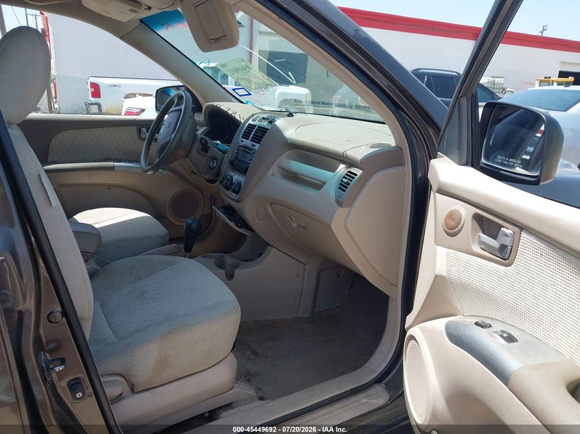 2006 Kia Sportage VIN KNDJF723967141488 IAAI salvage auction — NORMAL WEAR, Original (Texas), sold $450 on 2026-07-29 (photo 5)