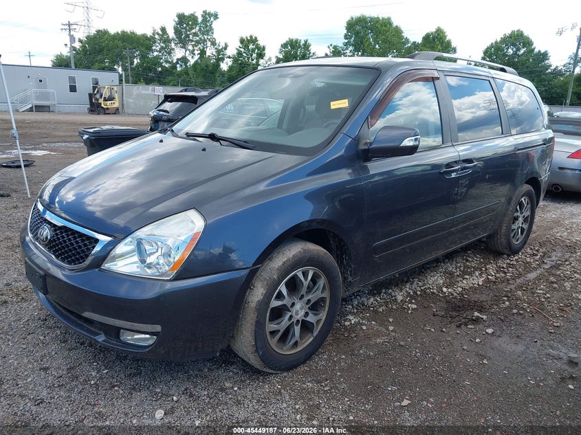 2014 Kia SEDONA VIN KNDMG4C70E6553765 IAAI salvage auction — NORMAL WEAR, Salvage Title, sold $575 on 2026-08-23 (photo 2)