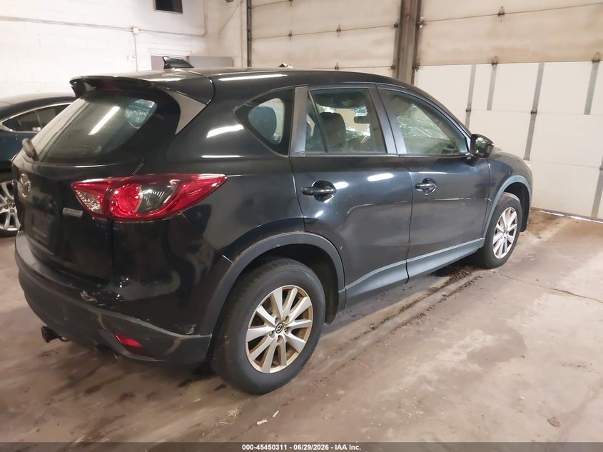 2013 Mazda Cx-5 VIN JM3KE2BE6D0111325 IAAI salvage auction — NORMAL WEAR, Clear (Minnesota), sold $625 on 2026-07-15 (photo 4)
