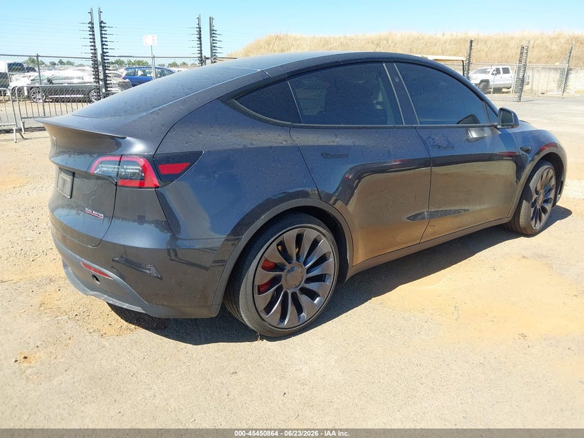 2024 Tesla Model y VIN 7SAYGDEF3RF129855 IAAI salvage auction — LEFT FRONT, Salvage Title, sold $20,100 on 2026-07-22 (photo 4)