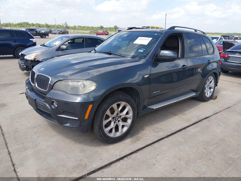 2011 BMW X5 VIN 5UXZV4C58BL401903 IAAI salvage auction — WATER/FLOOD, Salvage (Texas), sold $525 on 2026-07-24 (photo 2)
