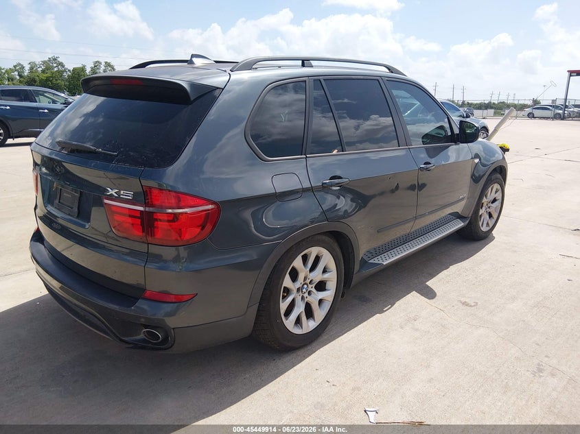 2011 BMW X5 VIN 5UXZV4C58BL401903 IAAI salvage auction — WATER/FLOOD, Salvage (Texas), sold $525 on 2026-07-24 (photo 4)