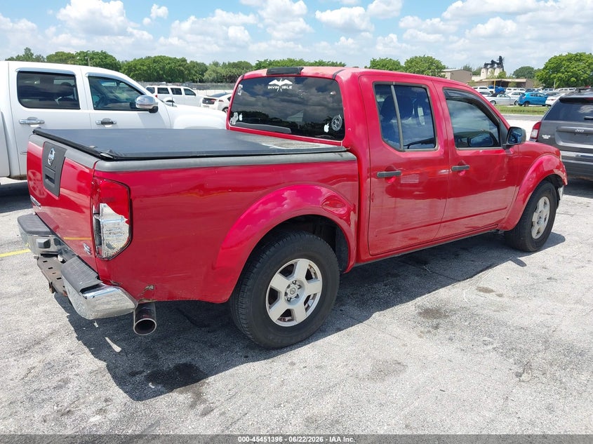 2005 Nissan Navara (frontier) VIN 1N6AD07U95C447088 IAAI salvage auction — NORMAL WEAR, Clear (Florida), sold $1,400 on 2026-07-09 (photo 4)