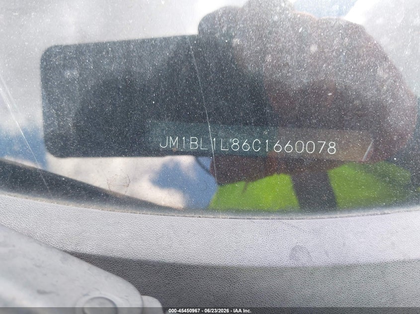 2012 Mazda 3 VIN JM1BL1L86C1660078 IAAI salvage auction — NORMAL WEAR, Salvage Title, sold $350 on 2026-07-27 (photo 9)