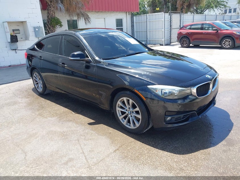 2014 BMW 3 series VIN WBA3X5C57ED557563 IAAI salvage auction — NORMAL WEAR, Clear (Florida), sold $2,500 on 2026-07-22 (photo 1)