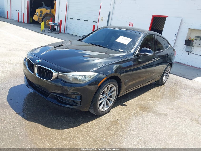 2014 BMW 3 series VIN WBA3X5C57ED557563 IAAI salvage auction — NORMAL WEAR, Clear (Florida), sold $2,500 on 2026-07-22 (photo 2)