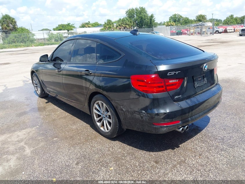 2014 BMW 3 series VIN WBA3X5C57ED557563 IAAI salvage auction — NORMAL WEAR, Clear (Florida), sold $2,500 on 2026-07-22 (photo 3)