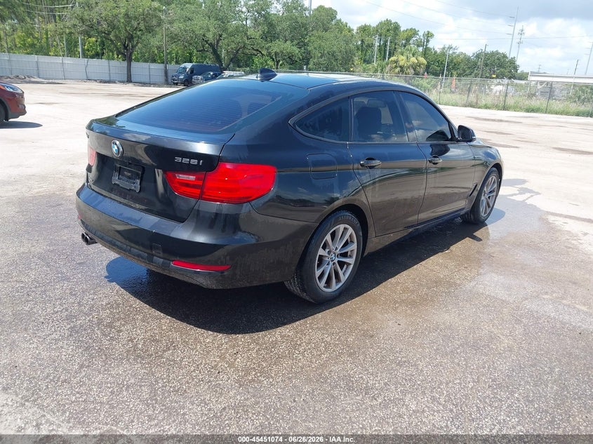 2014 BMW 3 series VIN WBA3X5C57ED557563 IAAI salvage auction — NORMAL WEAR, Clear (Florida), sold $2,500 on 2026-07-22 (photo 4)