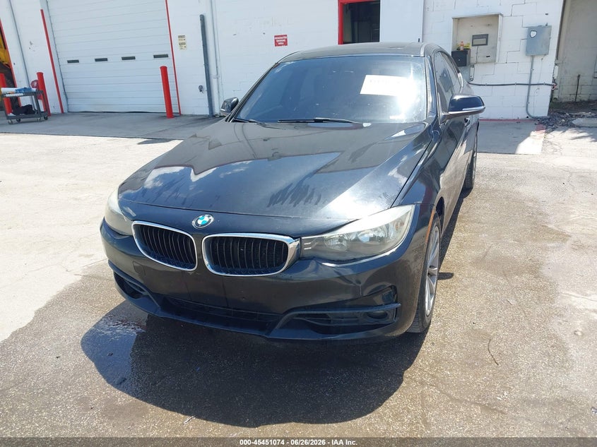 2014 BMW 3 series VIN WBA3X5C57ED557563 IAAI salvage auction — NORMAL WEAR, Clear (Florida), sold $2,500 on 2026-07-22 (photo 6)