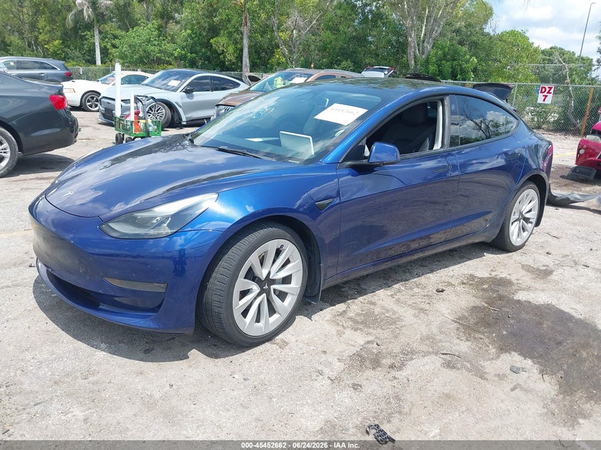 2023 Tesla Model 3 VIN 5YJ3E1EA0PF435957 IAAI salvage auction — UNDERCARRIAGE, Salvage Title, sold $7,400 on 2026-07-24 (photo 2)