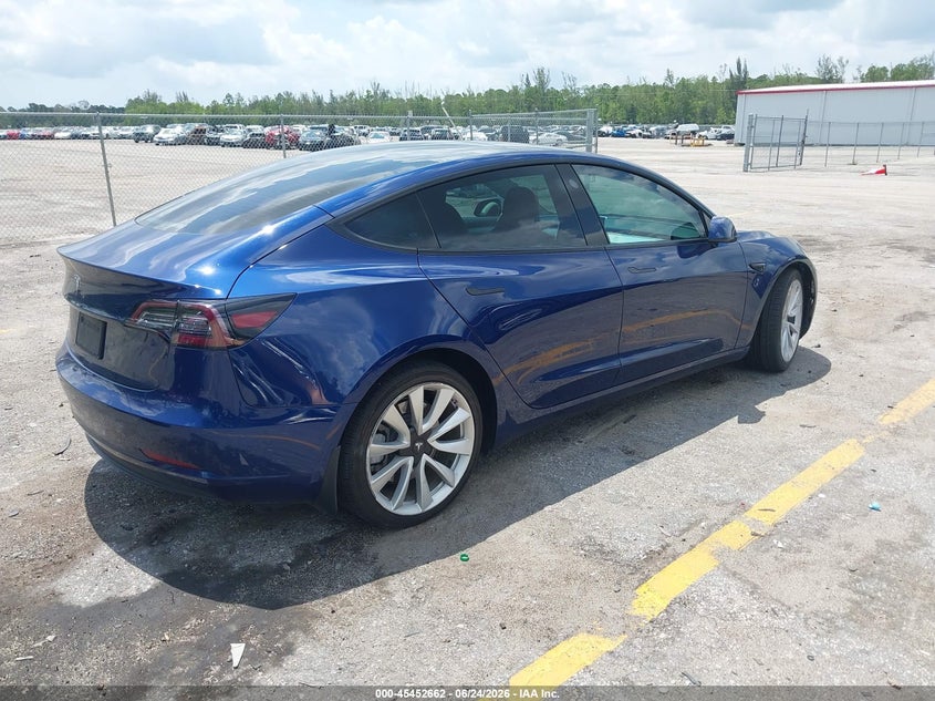 2023 Tesla Model 3 VIN 5YJ3E1EA0PF435957 IAAI salvage auction — UNDERCARRIAGE, Salvage Title, sold $7,400 on 2026-07-24 (photo 4)