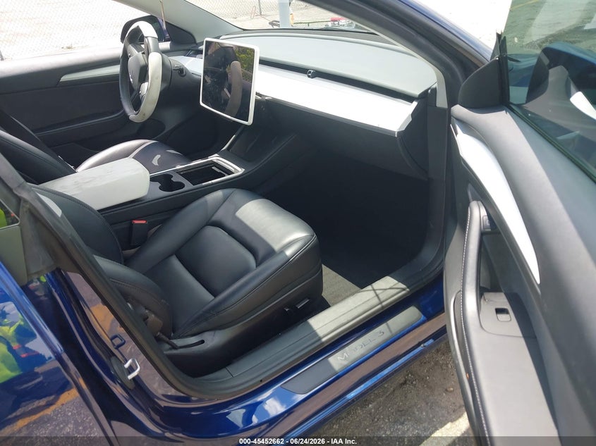 2023 Tesla Model 3 VIN 5YJ3E1EA0PF435957 IAAI salvage auction — UNDERCARRIAGE, Salvage Title, sold $7,400 on 2026-07-24 (photo 5)