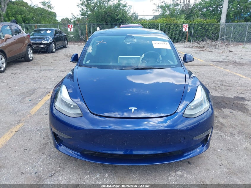 2023 Tesla Model 3 VIN 5YJ3E1EA0PF435957 IAAI salvage auction — UNDERCARRIAGE, Salvage Title, sold $7,400 on 2026-07-24 (photo 6)