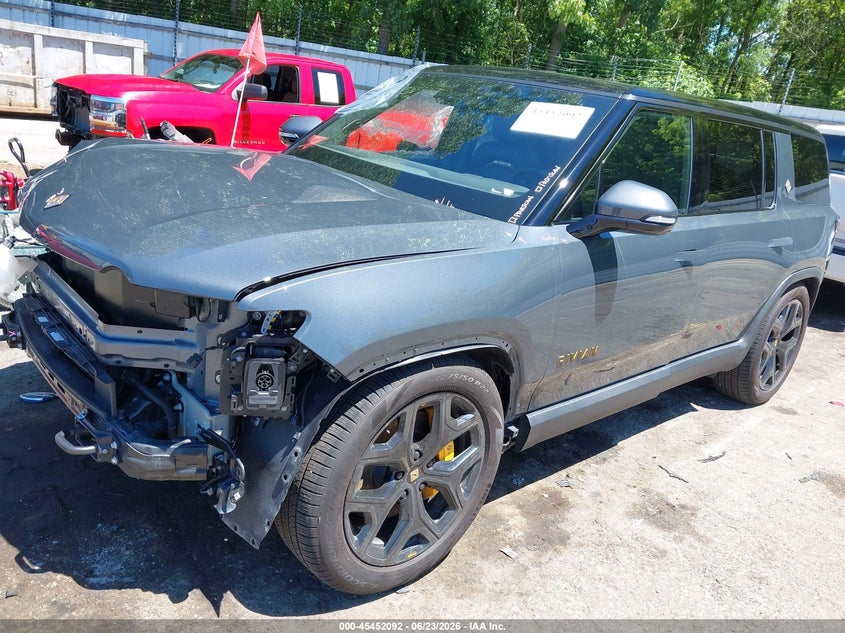 2025 Rivian R1s VIN 7PDSGCBP2SN057864 IAAI salvage auction — FRONT END, Salvage Title, sold $36,100 on 2026-08-17 (photo 2)