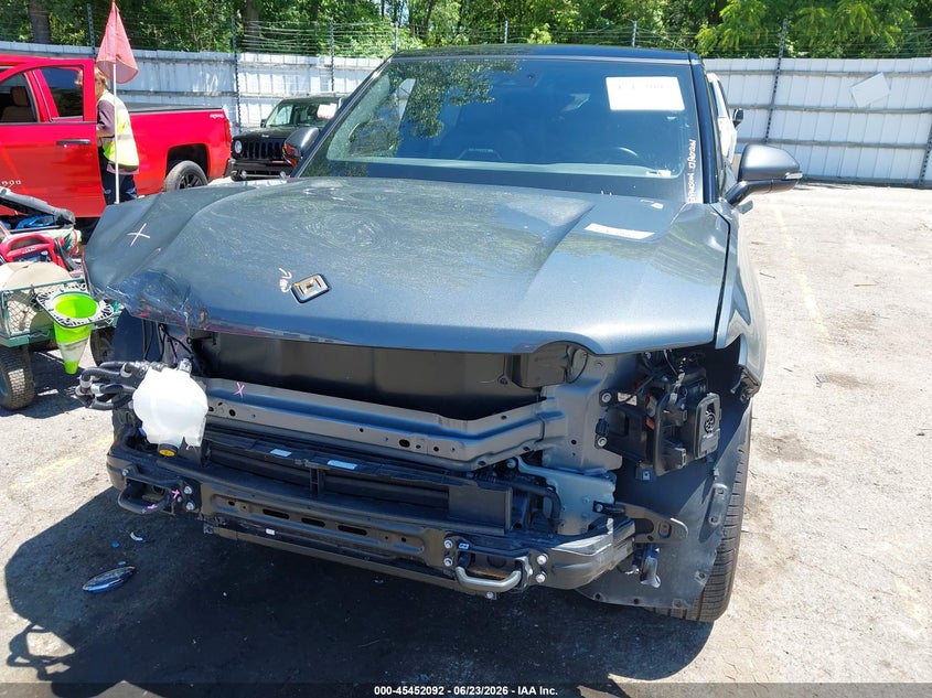 2025 Rivian R1s VIN 7PDSGCBP2SN057864 IAAI salvage auction — FRONT END, Salvage Title, sold $36,100 on 2026-08-17 (photo 6)