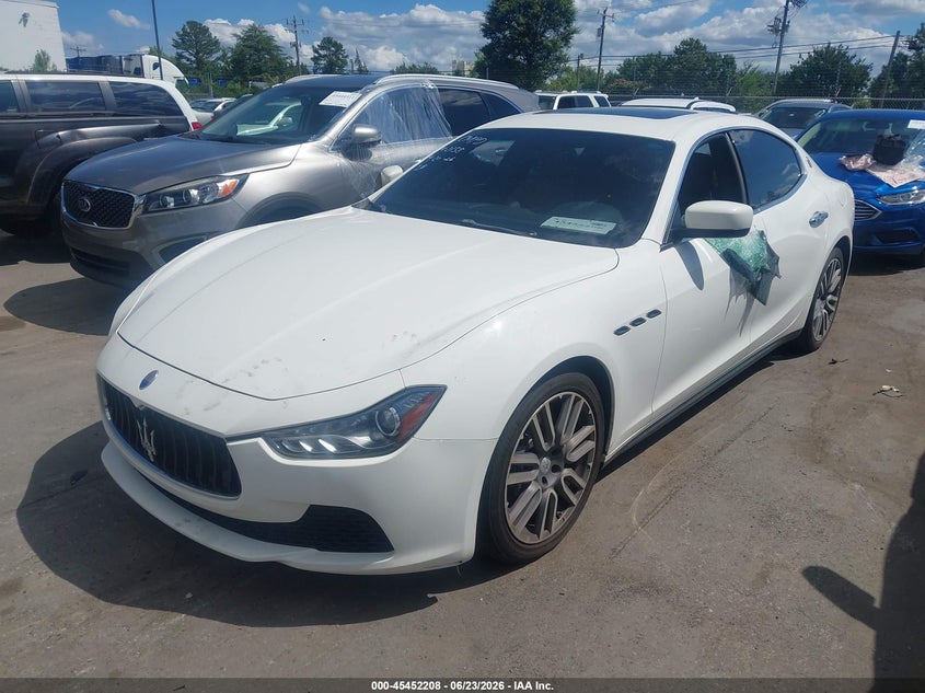 2015 Maserati Ghibli VIN ZAM57XSA0F1162158 IAAI salvage auction — LEFT & RIGHT, Salvage Title, sold $3,975 on 2026-09-09 (photo 2)