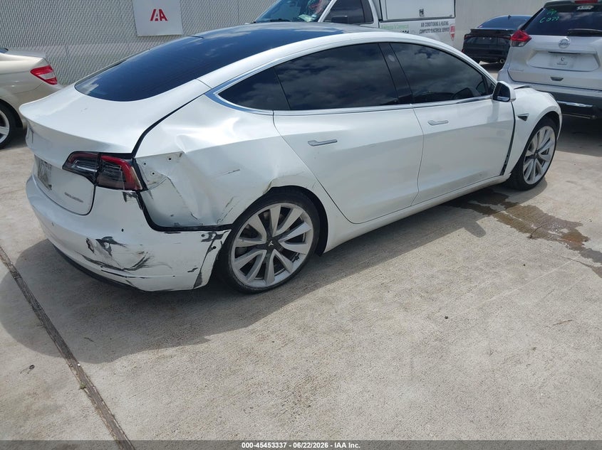2020 Tesla Model 3 VIN 5YJ3E1EB3LF667357 IAAI salvage auction — FRONT & REAR, Clear (New Jersey), sold $5,800 on 2026-07-10 (photo 4)