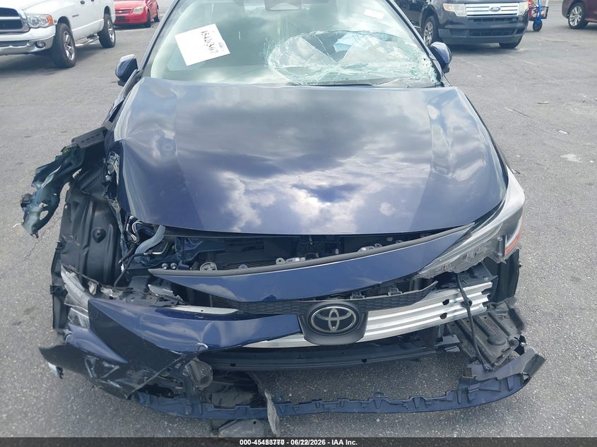 2023 Toyota Corolla VIN JTDB4MEE0PJ003865 IAAI salvage auction — FRONT & REAR, Salvage Title, sold $2,825 on 2026-07-15 (photo 6)