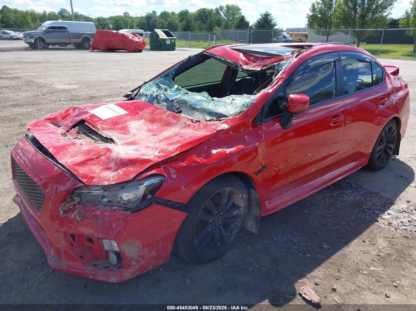 2016 Subaru Wrx VIN JF1VA1E6XG8823560 IAAI salvage auction — STORM DAMAGE, Salvage Title, sold $400 on 2026-07-28 (photo 2)