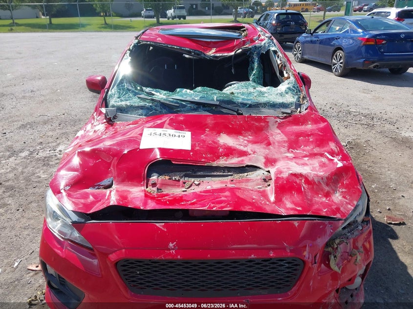 2016 Subaru Wrx VIN JF1VA1E6XG8823560 IAAI salvage auction — STORM DAMAGE, Salvage Title, sold $400 on 2026-07-28 (photo 6)