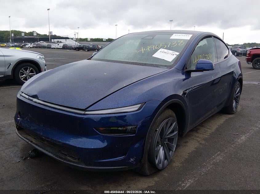 2026 Tesla Model y VIN 7SAYGDEE6TA633974 IAAI salvage auction — LEFT SIDE, Salvage Title, sold $21,200 on 2026-08-27 (photo 2)