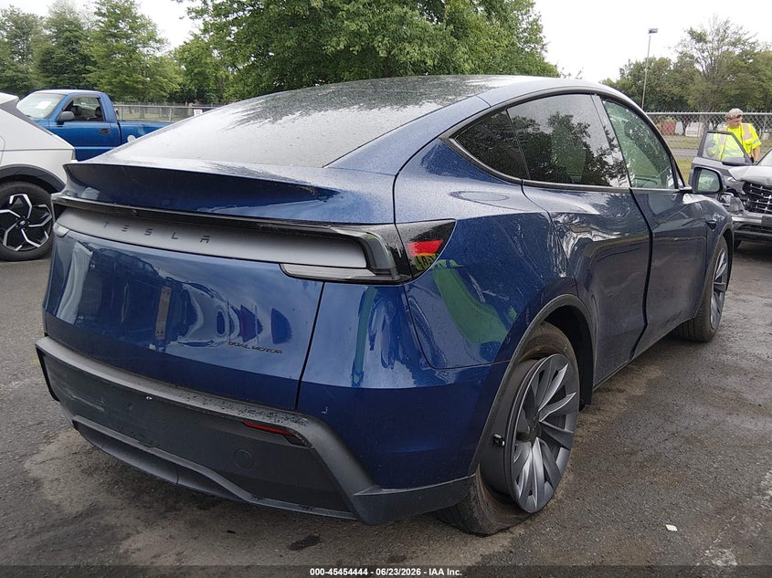 2026 Tesla Model y VIN 7SAYGDEE6TA633974 IAAI salvage auction — LEFT SIDE, Salvage Title, sold $21,200 on 2026-08-27 (photo 4)