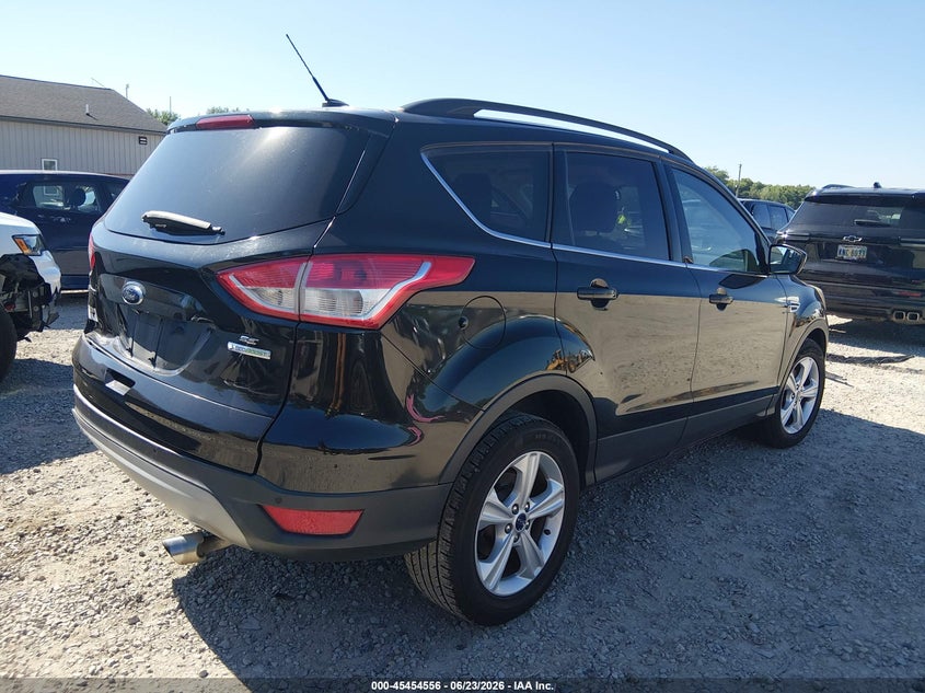 2014 Ford Escape VIN 1FMCU0GXXEUC58011 IAAI salvage auction — REAR END, Salvage (Ohio), sold $375 on 2026-07-11 (photo 4)