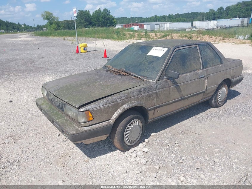 1990 Nissan Sentra VIN JN1GB22B2LU513947 IAAI salvage auction — NORMAL WEAR, Clear (Alabama), sold $225 on 2026-07-08 (photo 2)