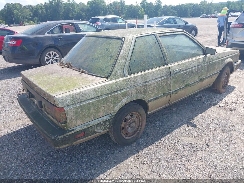 1990 Nissan Sentra VIN JN1GB22B2LU513947 IAAI salvage auction — NORMAL WEAR, Clear (Alabama), sold $225 on 2026-07-08 (photo 4)