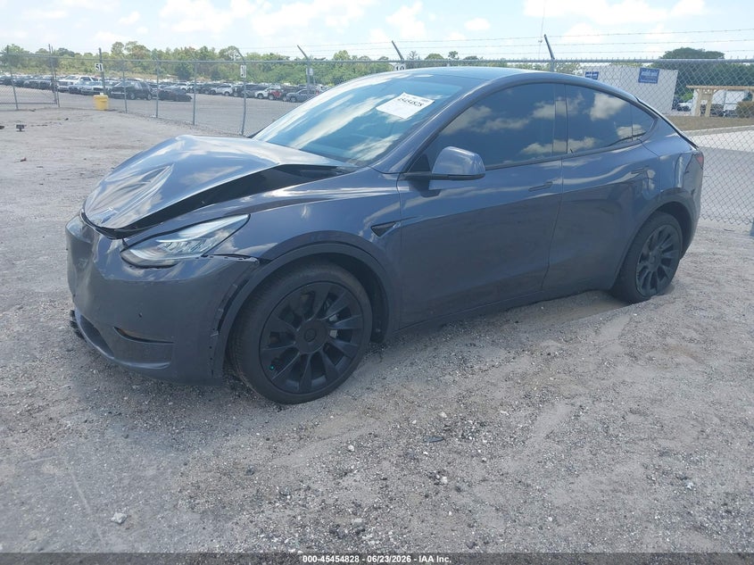 2022 Tesla Model y VIN 7SAYGDEE1NF306954 IAAI salvage auction — FRONT & REAR, Rebuildable (Florida), sold $7,150 on 2026-07-30 (photo 2)