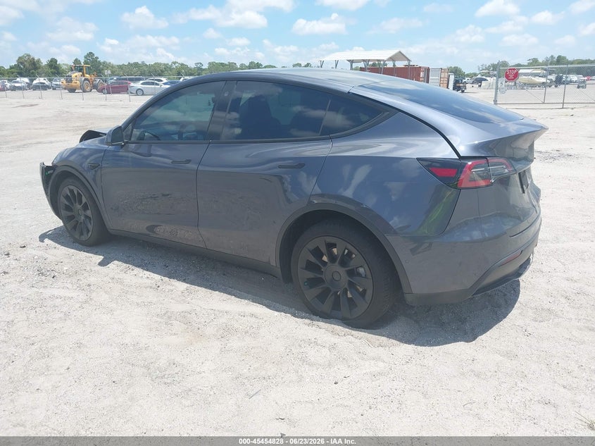 2022 Tesla Model y VIN 7SAYGDEE1NF306954 IAAI salvage auction — FRONT & REAR, Rebuildable (Florida), sold $7,150 on 2026-07-30 (photo 3)