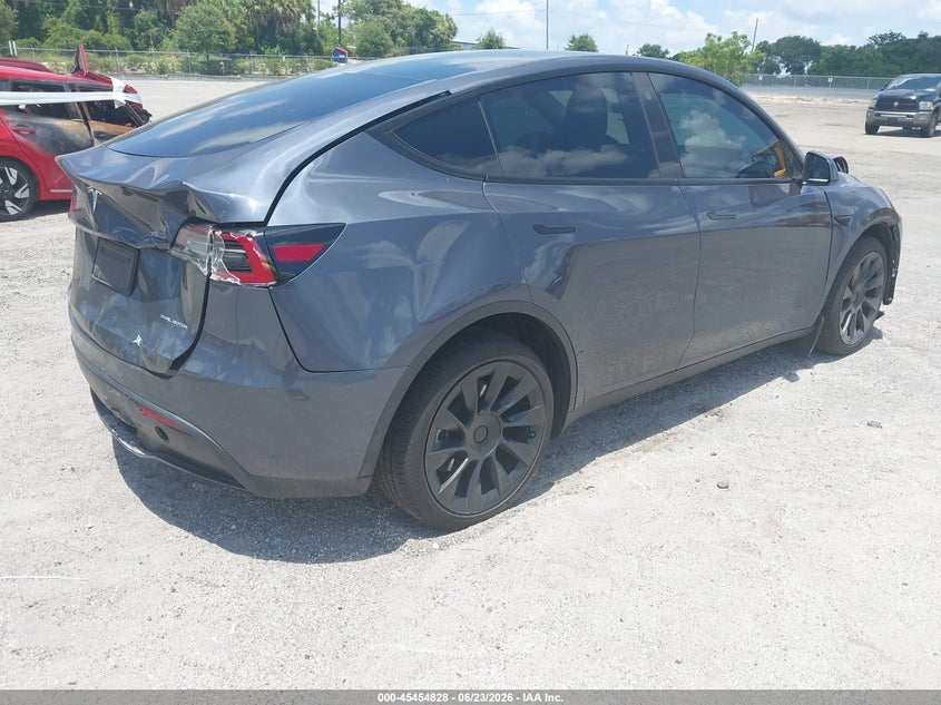 2022 Tesla Model y VIN 7SAYGDEE1NF306954 IAAI salvage auction — FRONT & REAR, Rebuildable (Florida), sold $7,150 on 2026-07-30 (photo 4)