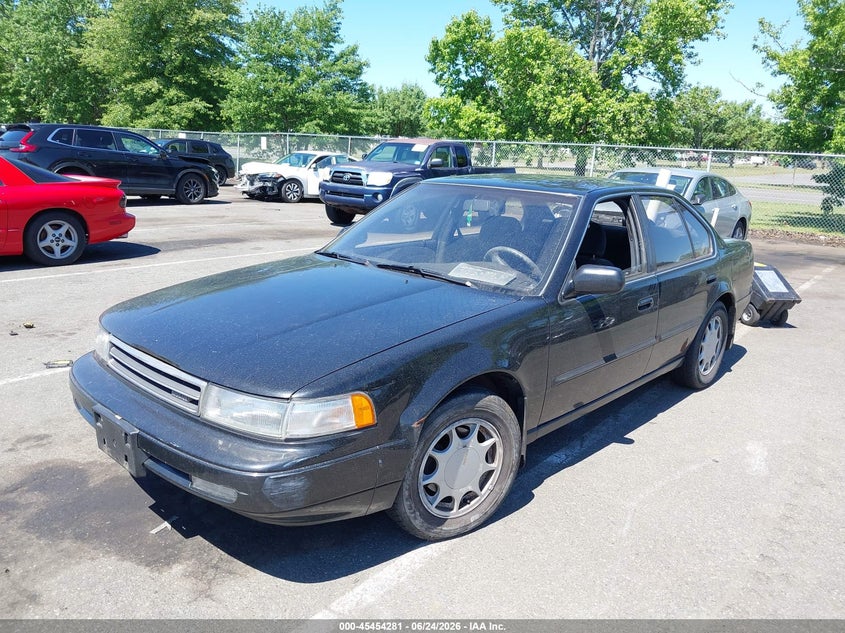 1990 Nissan Maxima VIN JN1HJ01P0LT448465 IAAI salvage auction — LEFT SIDE, Clear (New Jersey), sold $450 on 2026-07-13 (photo 2)