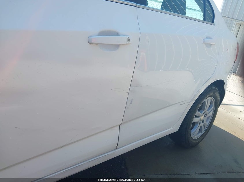 2014 Chevrolet SONIC VIN 1G1JC5SG6E4112121 IAAI salvage auction — NORMAL WEAR, Clear (Utah), sold $325 on 2026-07-09 (photo 6)