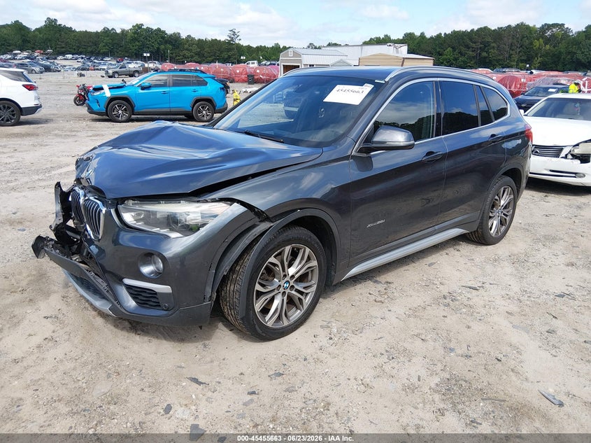 2016 BMW X1 VIN WBXHT3C31GP883323 IAAI salvage auction — FRONT & REAR, Clear (Georgia), sold $1,675 on 2026-07-17 (photo 2)