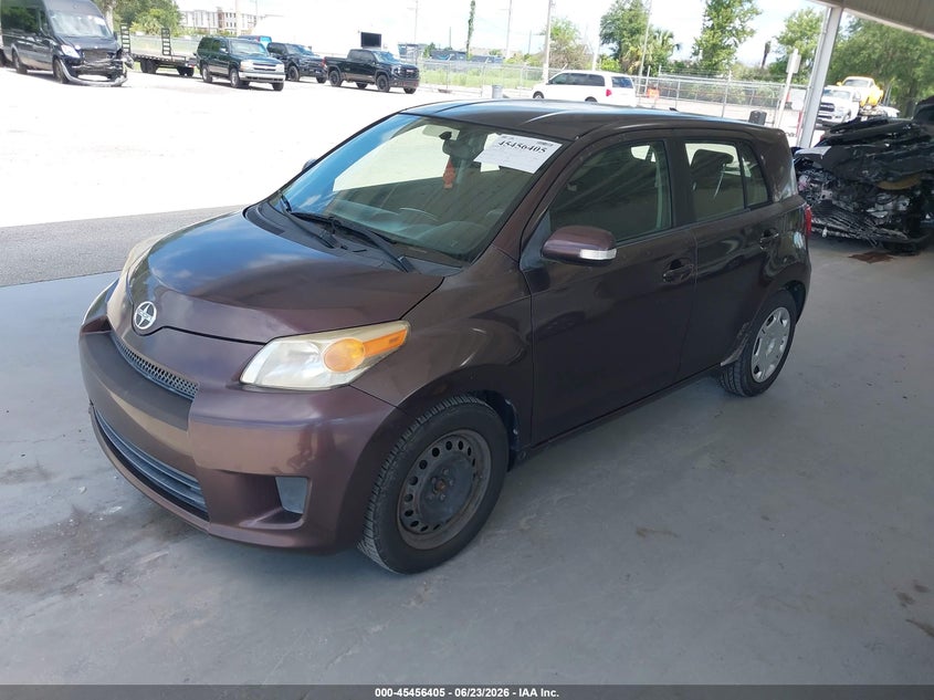 2010 Scion Xd VIN JTKKU4B46A1006927 IAAI salvage auction — NORMAL WEAR, Clear (Florida), sold $1,300 on 2026-07-08 (photo 2)