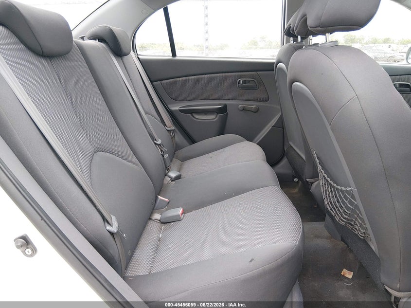 2011 Kia Rio VIN KNADH4A33B6927131 IAAI salvage auction — NORMAL WEAR, Clear (Mississippi), sold $325 on 2026-07-29 (photo 8)