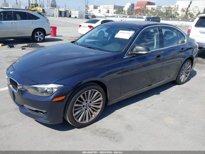 2014 BMW 3er VIN WBA3C1C57EK108190 IAAI salvage auction — REAR END, Salvage Title, sold $1,400 on 2026-07-15 (photo 2)