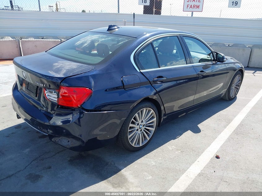 2014 BMW 3er VIN WBA3C1C57EK108190 IAAI salvage auction — REAR END, Salvage Title, sold $1,400 on 2026-07-15 (photo 4)