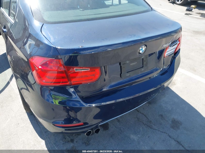 2014 BMW 3er VIN WBA3C1C57EK108190 IAAI salvage auction — REAR END, Salvage Title, sold $1,400 on 2026-07-15 (photo 6)