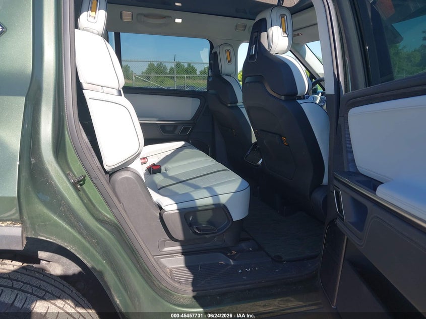 2023 Rivian R1s VIN 7PDSGBBA5PN025570 IAAI salvage auction — STORM DAMAGE, Salvage Title, sold $22,600 on 2026-09-03 (photo 8)