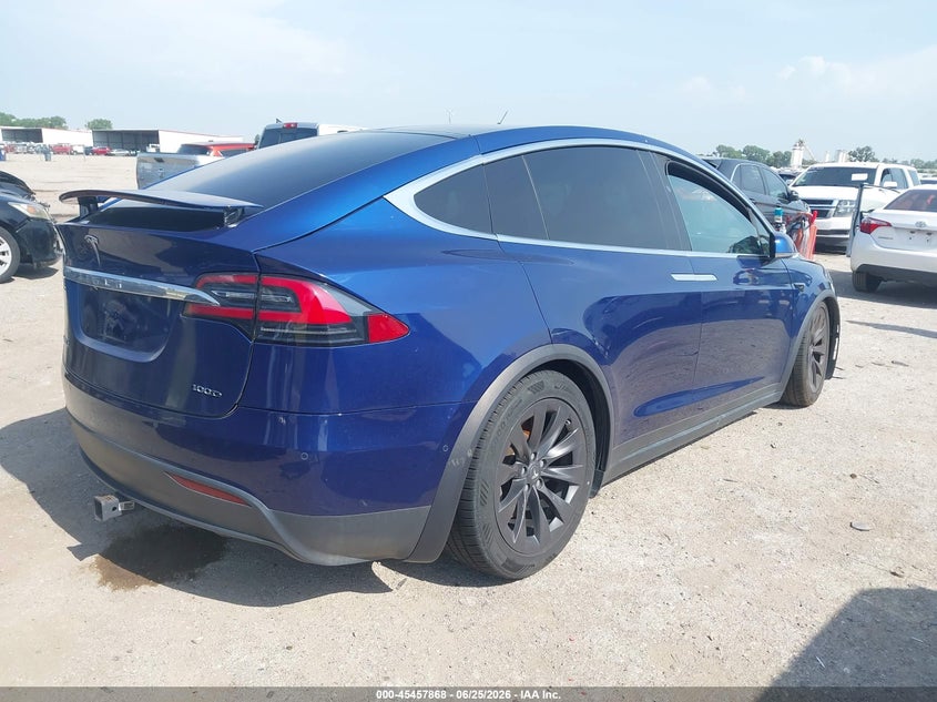 2019 Tesla Model x VIN 5YJXCAE26KF152679 IAAI salvage auction — SIDE, Salvage (Texas), sold $8,000 on 2026-07-21 (photo 4)