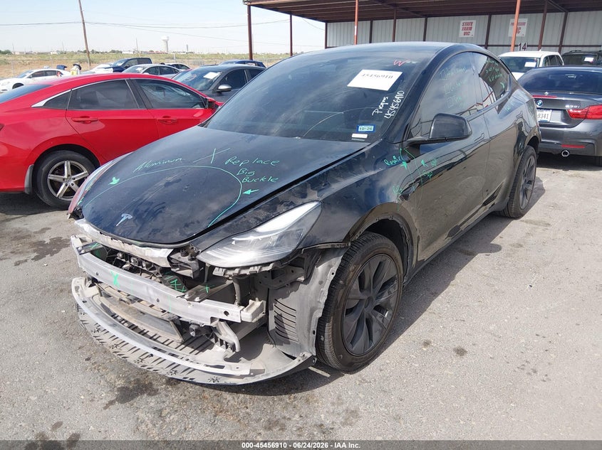 2024 Tesla Model y VIN 7SAYGDEEXRA317339 IAAI salvage auction — FRONT & REAR, Salvage Title, sold $13,700 on 2026-08-19 (photo 2)